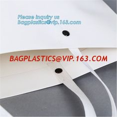 China custom christmas carrier kraft paper gift shopping bag,brand dark blue 3D patch coated paper bag for gift toy carrier ba supplier