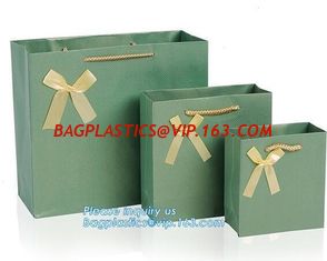 China Waterproof Luxury Christmas Raw Materials Of Making Paper Carrier Gift Bag with Twisted Handle，Factory Promotional Small supplier