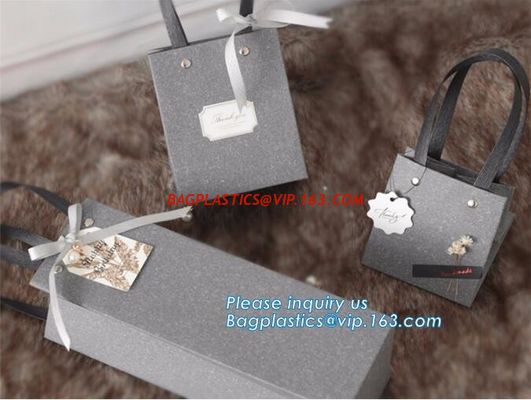 China Luxury Customized White and Colorful Printed Paper Shopping Bag with Logo,order advanced paper material carrier shopping supplier