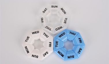 One week 7 compartments round shaped plastic pill organizer, Travel plastic pill containers 7 compartment space planner supplier