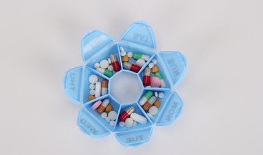 One week 7 compartments round shaped plastic pill organizer, Travel plastic pill containers 7 compartment space planner supplier