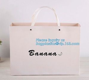 custom christmas carrier kraft paper gift shopping bag,brand dark blue 3D patch coated paper bag for gift toy carrier ba supplier