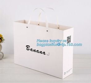 custom christmas carrier kraft paper gift shopping bag,brand dark blue 3D patch coated paper bag for gift toy carrier ba supplier