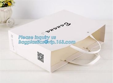 custom christmas carrier kraft paper gift shopping bag,brand dark blue 3D patch coated paper bag for gift toy carrier ba supplier