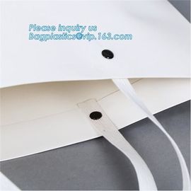 custom christmas carrier kraft paper gift shopping bag,brand dark blue 3D patch coated paper bag for gift toy carrier ba supplier