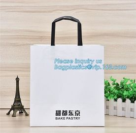 custom christmas carrier kraft paper gift shopping bag,brand dark blue 3D patch coated paper bag for gift toy carrier ba supplier