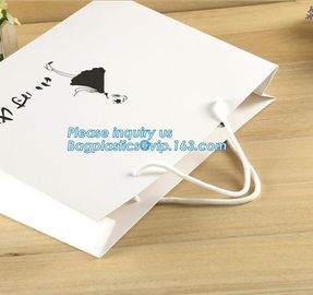 custom christmas carrier kraft paper gift shopping bag,brand dark blue 3D patch coated paper bag for gift toy carrier ba supplier