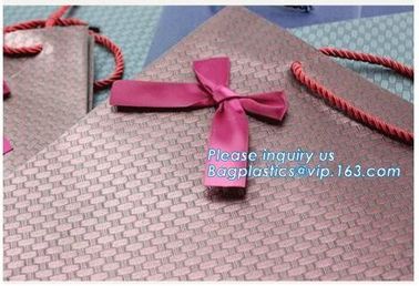 China manufacturer matt lamination christmas gift paper bag with cotton handle,New Design White Handmade Paper Bag pack supplier
