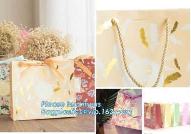 China manufacturer matt lamination christmas gift paper bag with cotton handle,New Design White Handmade Paper Bag pack supplier