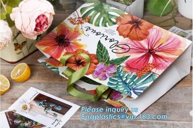 China manufacturer matt lamination christmas gift paper bag with cotton handle,New Design White Handmade Paper Bag pack supplier