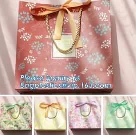 China manufacturer matt lamination christmas gift paper bag with cotton handle,New Design White Handmade Paper Bag pack supplier