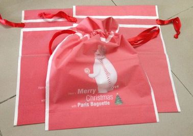 Biodegradable Christmas deco drawstring candy storage bag, oxford red christmas stocking candy bag packing bagplastics supplier